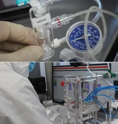 Pressure decay testing of a microfluidic device cartridge using vacuum gauge and tubing to detect leaks
