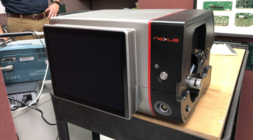 Misonix Nexus ultrasonic surgical platform alpha prototype on workbench